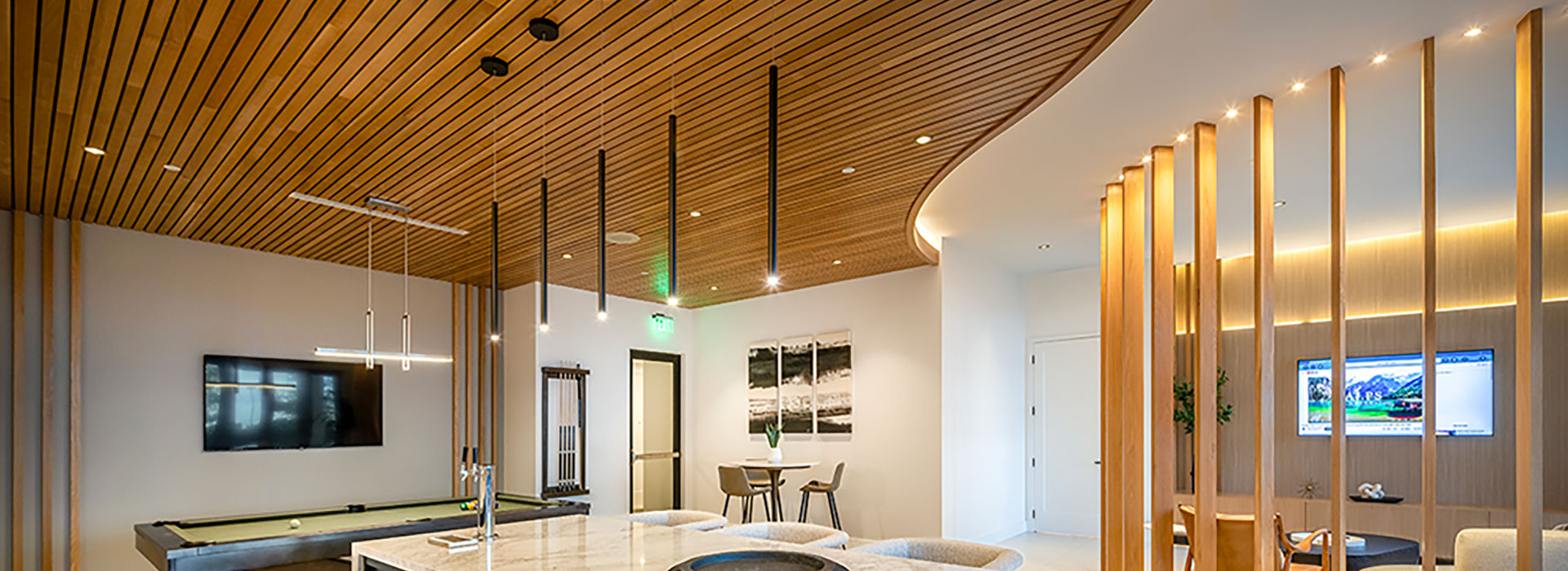 Decorative pendant lighting and cove lighting at Anya